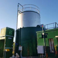 Lime slurry storage tank