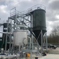Designed to transfer the quicklime into a stainless steel sludge mix tank via a tubular screw conveyor