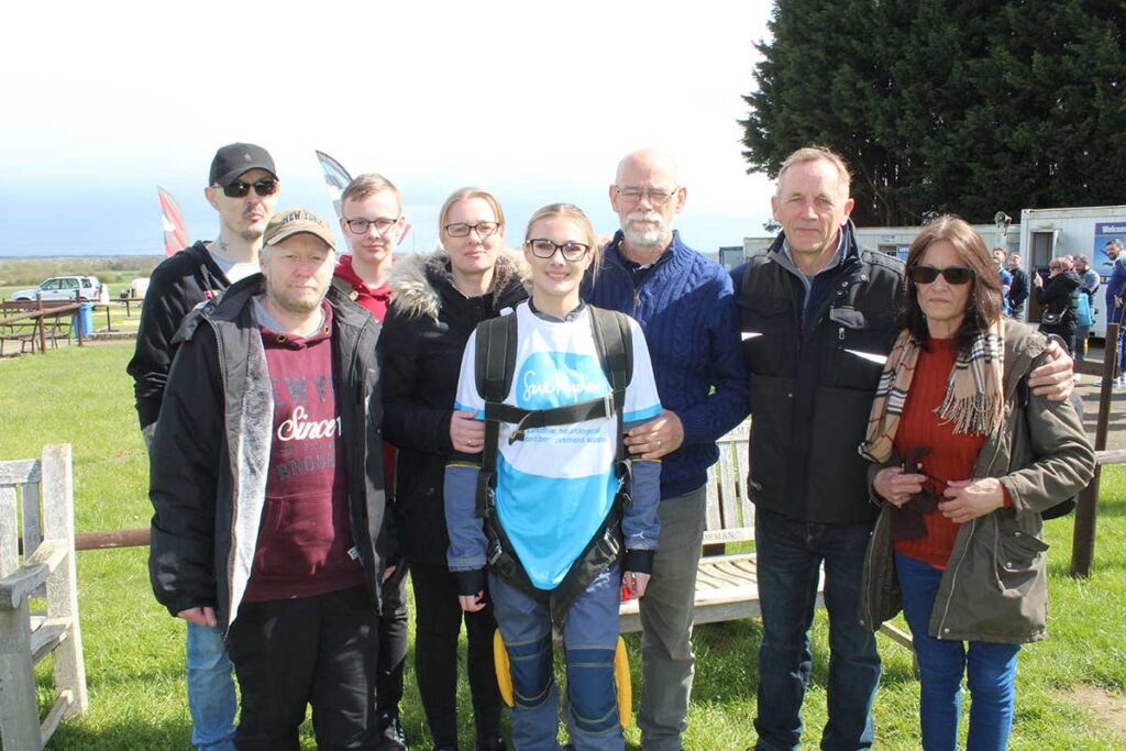 Sascha Kennedy and family at Sibson Aerodrome before her skydive to raise money for Sue Ryder charity